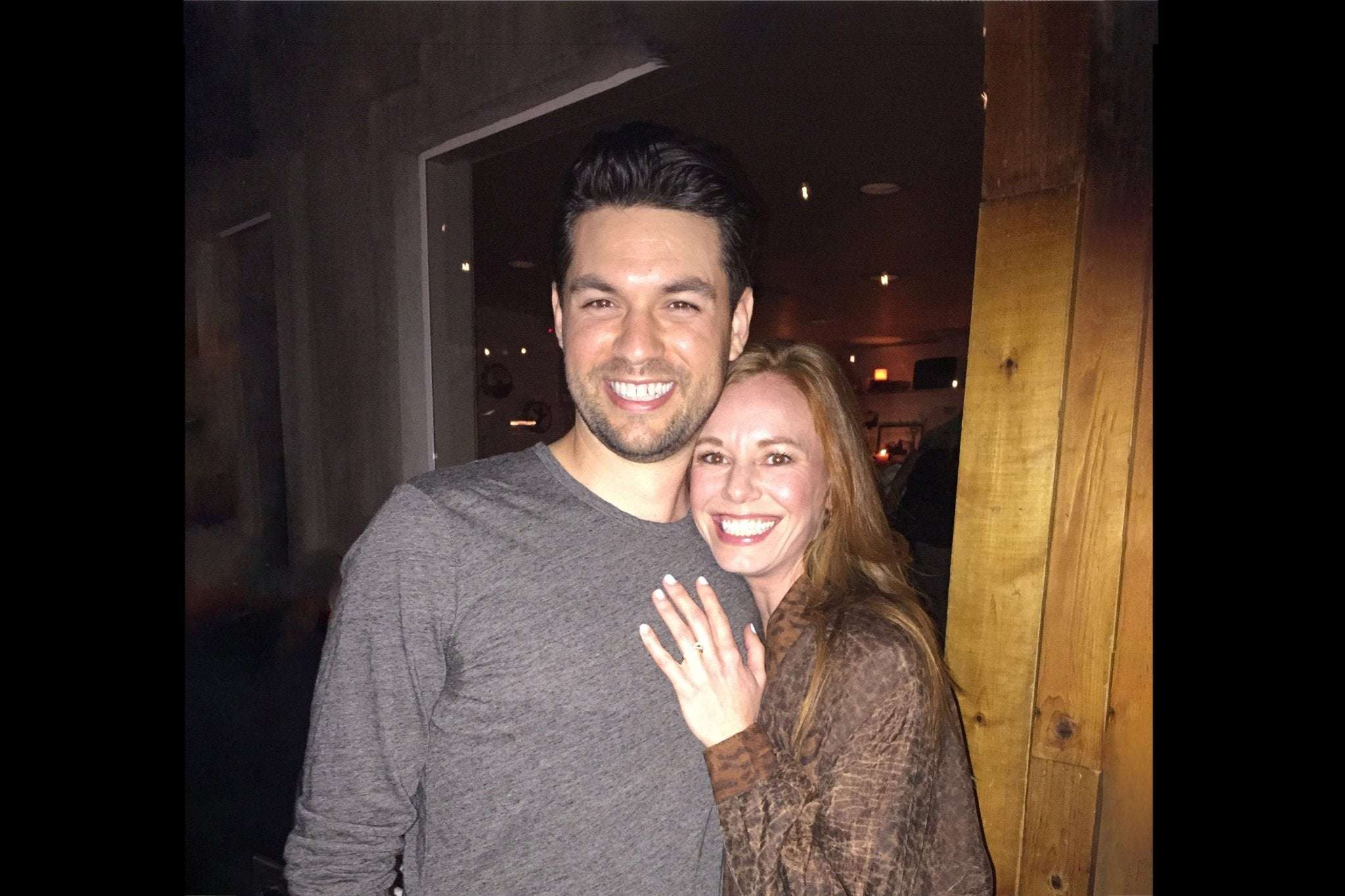 Happy couple smiling together during proposal celebration moment Proposal Stories Episode 2