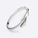 Elegant sterling silver Cascade Bracelet with flowing, sculptural design and integrated clasp.