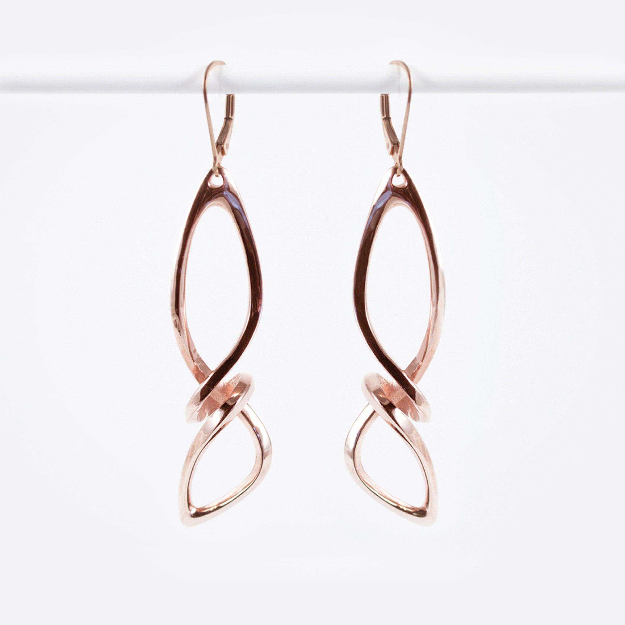 Centri Earrings in 18K rose gold vermeil with long loose knot design and elegant precision edge detailing
