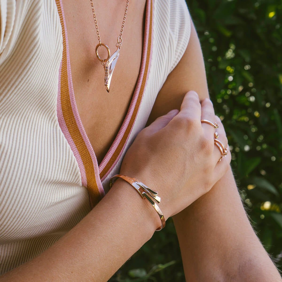 Elegant Cascade Bracelet in 18K Rose Gold Vermeil with flowing sculptural design and seamless clasp on wrist