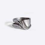 Velum Stainless Steel Ring with drapery-inspired curved design and open back in stainless steel 316