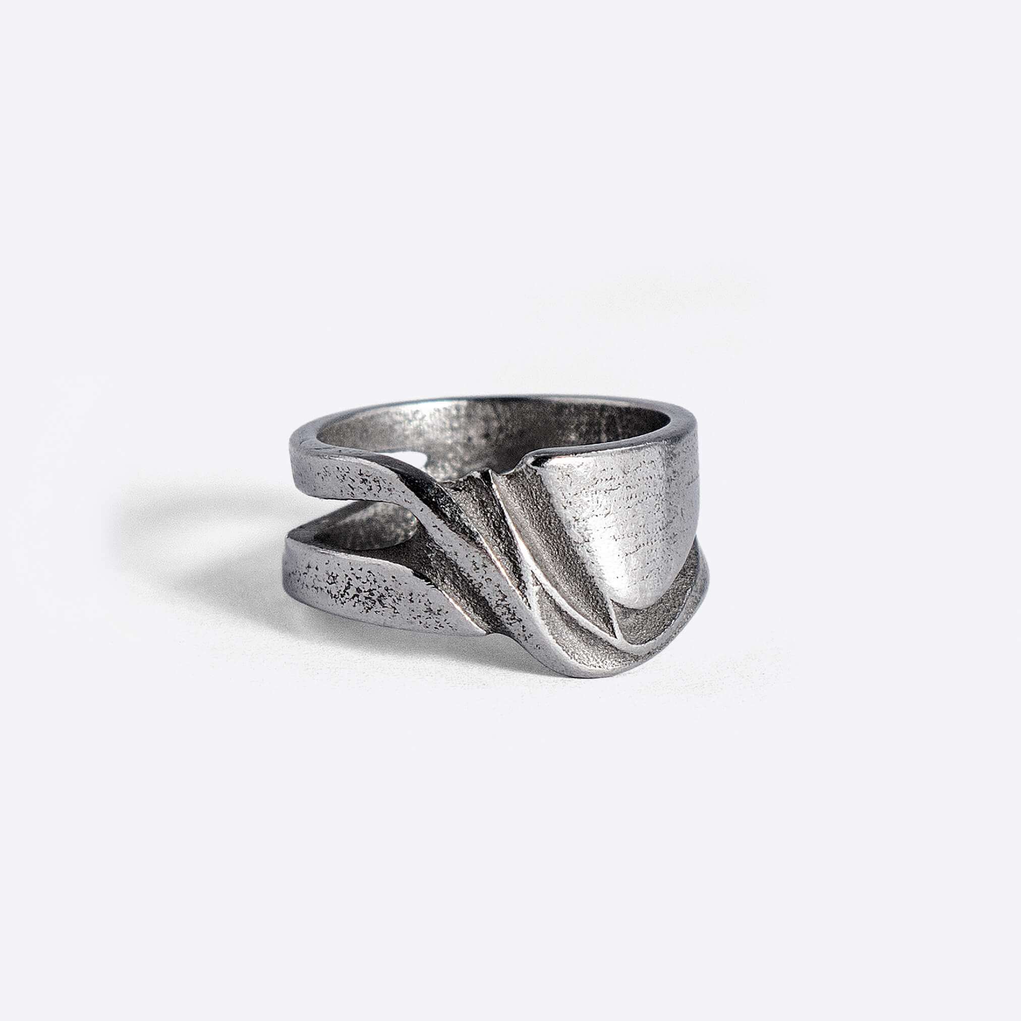 Velum Stainless Steel Ring with drapery-inspired curved design and open back in stainless steel 316