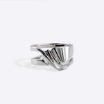 Velum Ring in sterling silver with drapery-inspired curved design and open back bands