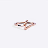 Rose gold Amare Sera Ring with delicate twisting knot design