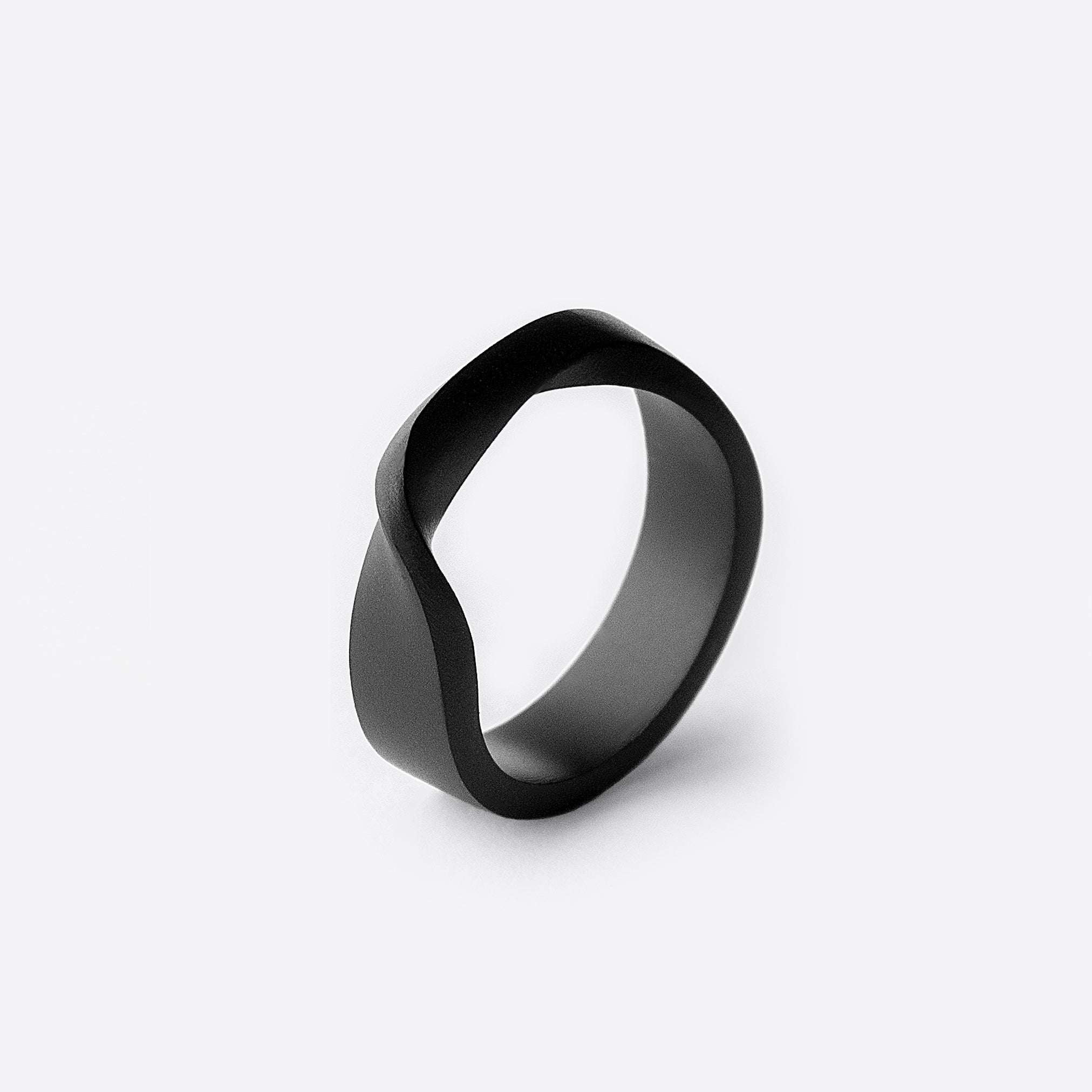 Amor Stainless Steel Ring with black PVD finish and twisted band design