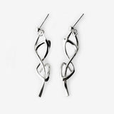 Silver Nova earrings with elegant twisted knot design and high-precision edge detailing