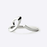 Sterling silver Hydra Ring with an open, adjustable curved design and sculpted oval loop for a modern look