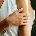 Hydra Ring sterling silver open adjustable ring on finger with elegant curved design