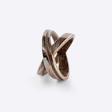 X Steel Ring with crossing tapering lines and precision edge detailing in stainless steel bronze finish