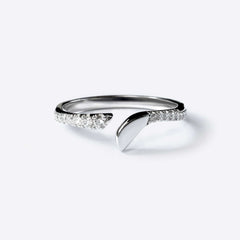 Rosae Wedding Band in platinum with pave diamonds, minimalist petal-shaped design, elegant stacking ring.