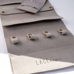 Gray LACE Travel Jewelry Roll organizer with compartments and snap closures for rings and earrings