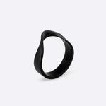 Amos Stainless Steel Ring black twisted band with precision edge detailing on white background