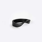 Black Amos Stainless Steel Ring with twisted band design on white background