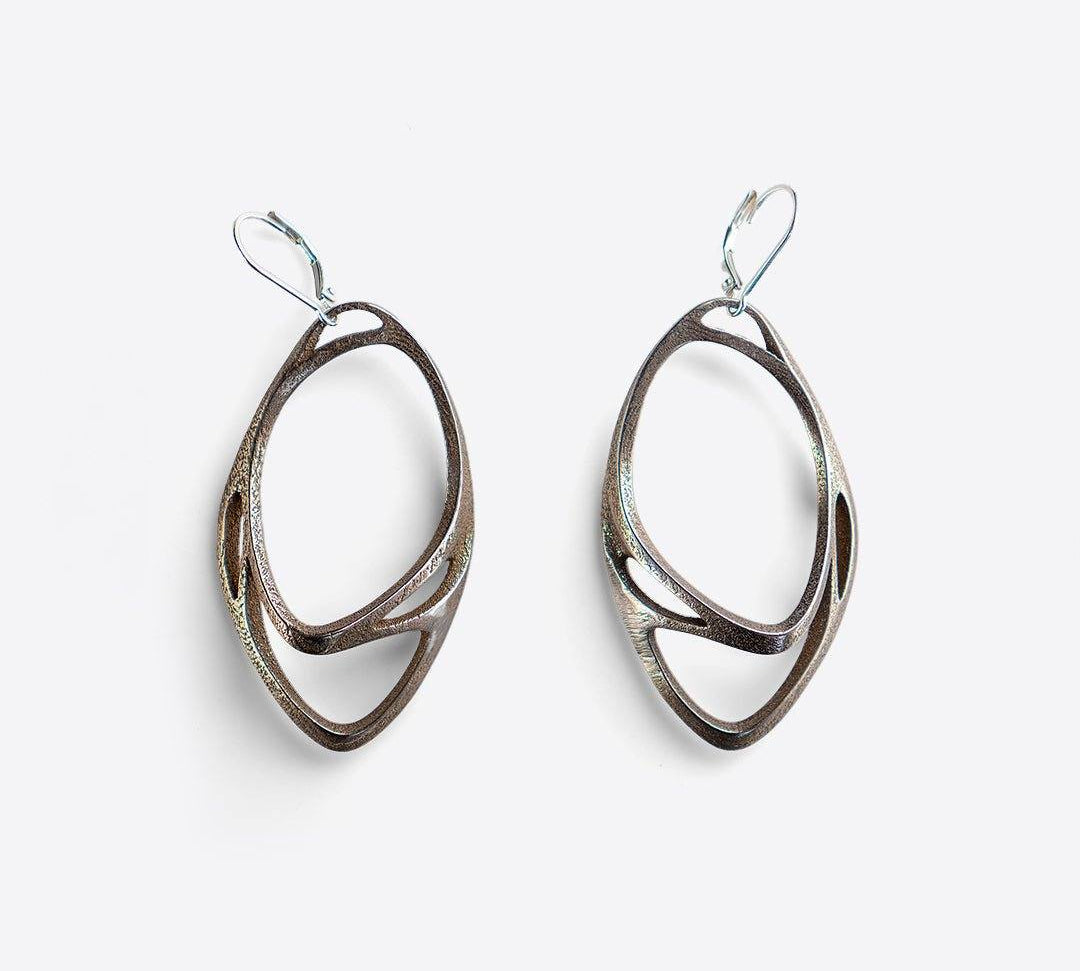 Eclipse Steel light petite hoop earrings with overlapping oval rings in stainless steel and bronze finish