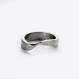 Amos Stainless Steel Ring with minimalist twisting band design on white background