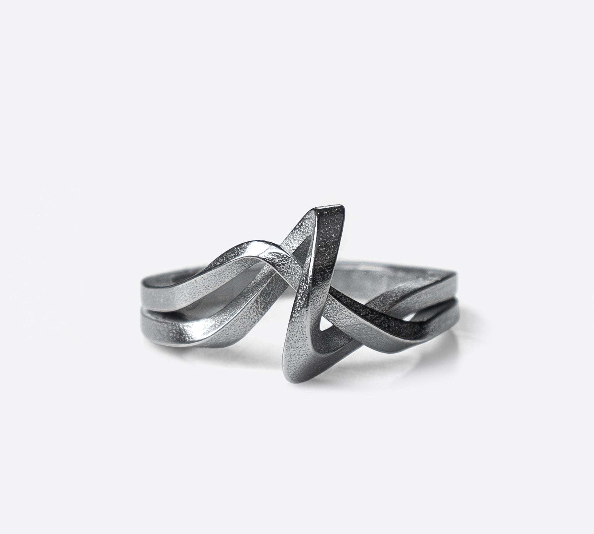 Amare Stainless Steel Ring with twisted loose knot design in brushed finish