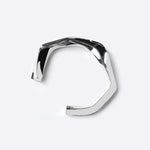 Oblique Cuff sterling silver bracelet with bold, sculptural design and intricate detailing.