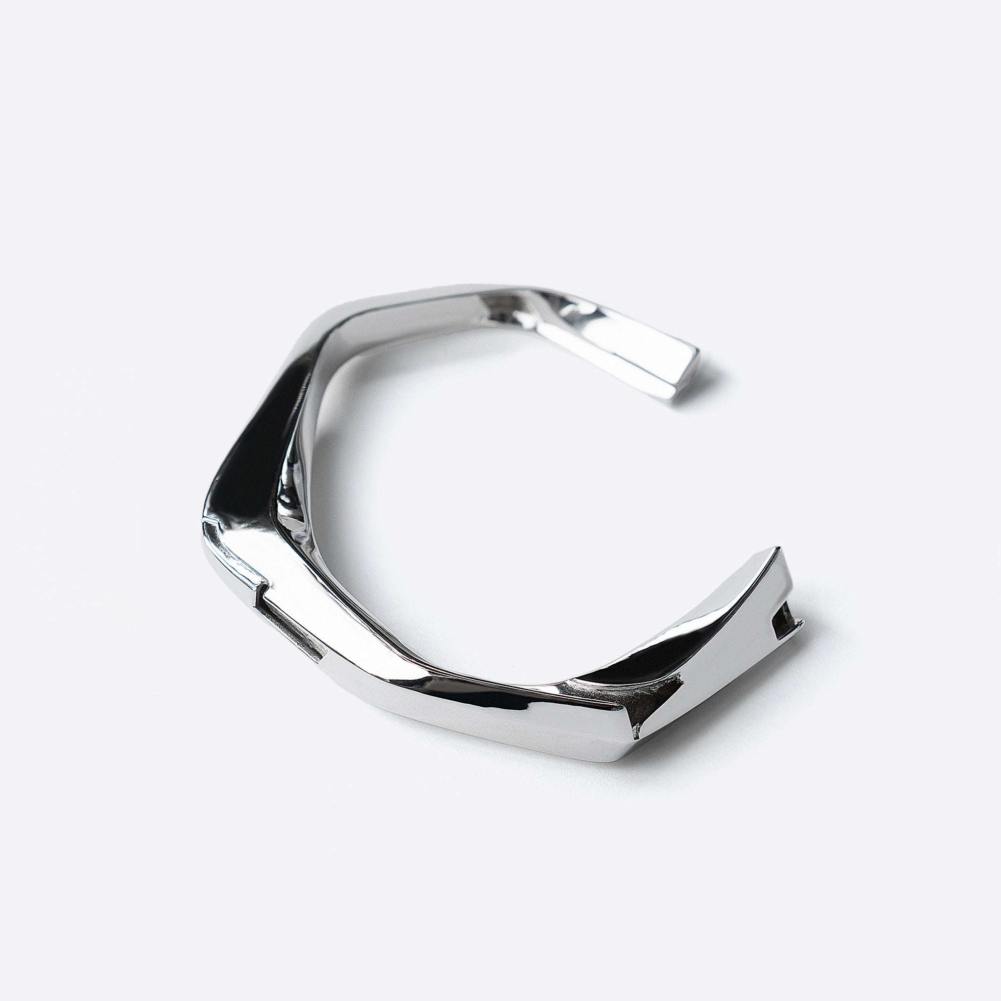 Oblique Cuff sterling silver bracelet with bold sculptural design and polished finish
