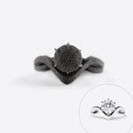 Close-up of a black nylon engagement ring sample from the Engagement Ring Samples Set showing detailed design and shape with an inset of the matching silver designer ring with diamond.