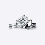Calyx Diamond Ring with 1.3 carat oval solitaire and intertwined band design
