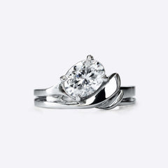 Calyx Diamond Ring with 1.3 carat oval solitaire and intertwined band design