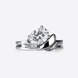 Close-up of a silver engagement ring with a large round diamond solitaire from the Engagement Ring Samples Set