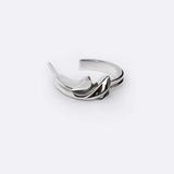 Calyx Mini Hoop silver earring with delicate layered petal design on white background