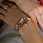 Cascade Bracelet in sterling silver and 18K rose gold vermeil with flowing sculptural design on wrist