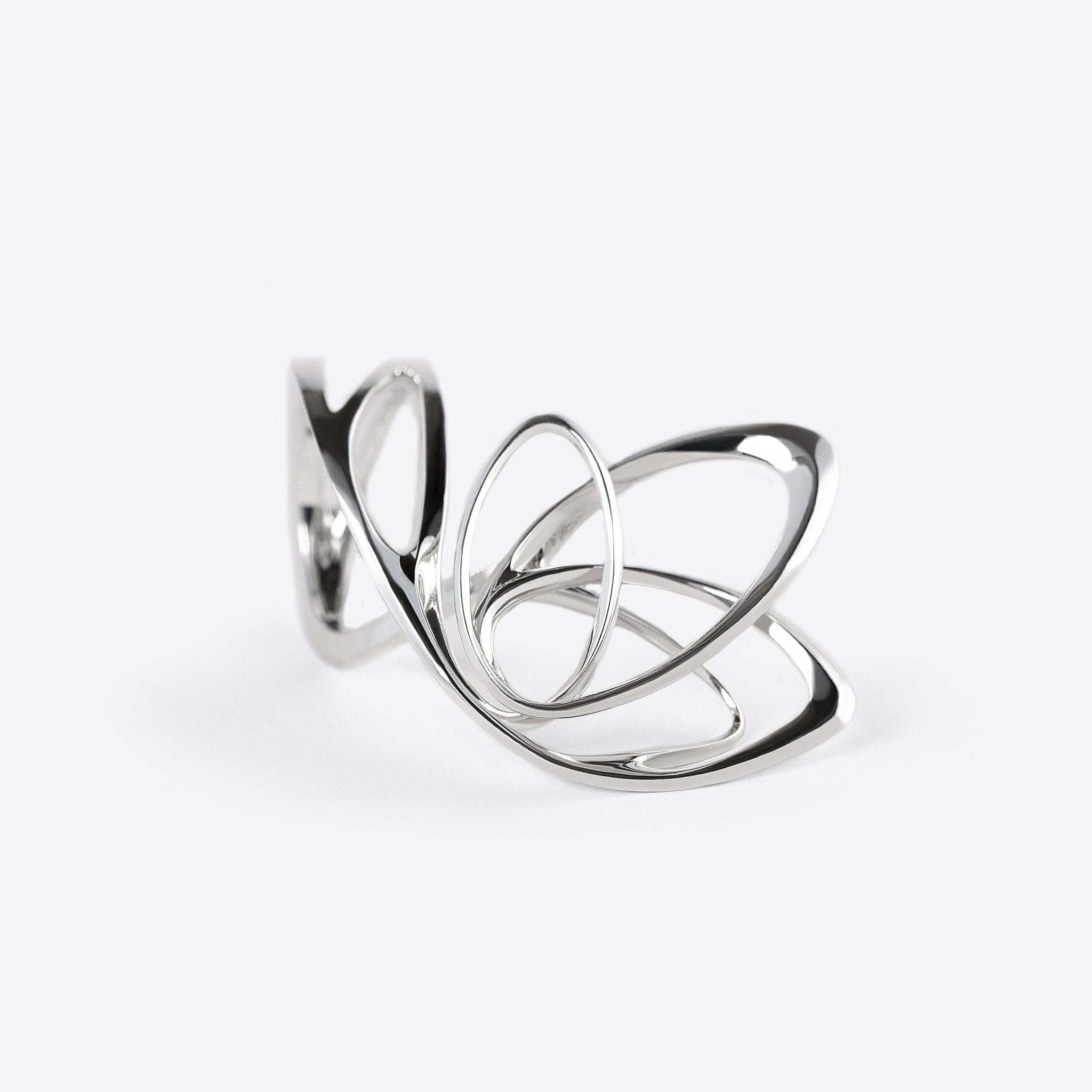 Sterling silver Papilio ring with four elliptical petal shapes and intricate edge detailing