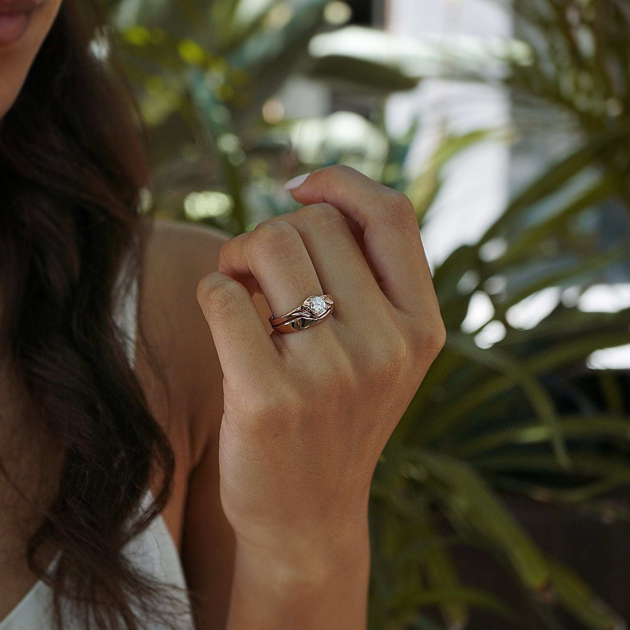 Iris Diamond Ring with 0.5 carat round diamond and intricate drapery design on hand