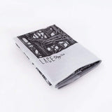 Folded Lineworks Bandana with black signature hand drawing on white premium cotton
