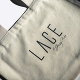 Beige LACE Tote Bag made of durable 100% cotton canvas with sturdy wide-strap handles, perfect for everyday use.