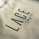 Close-up of beige LACE Tote Bag made from 100% cotton canvas with printed logo