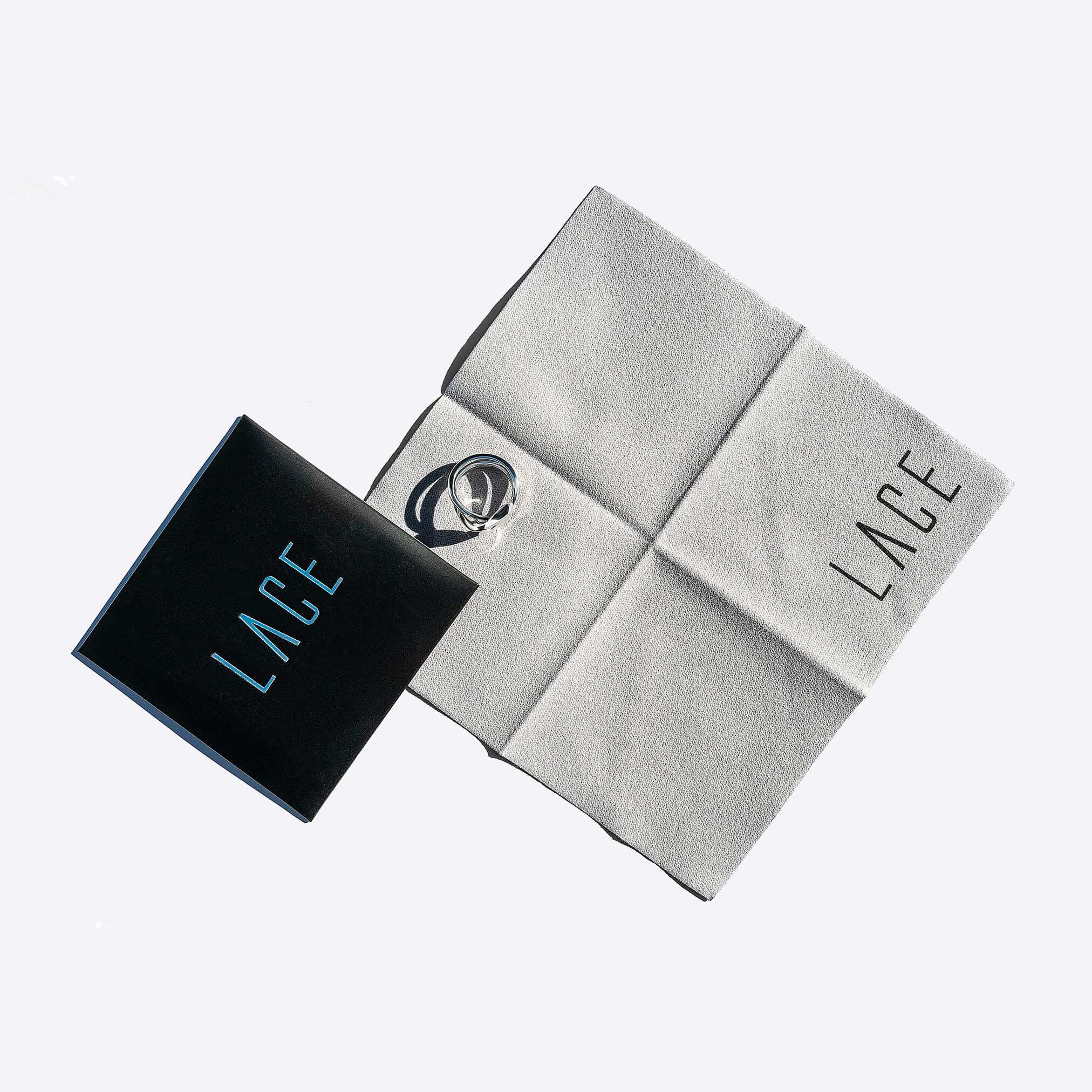Jewelry polishing cloth made of soft microfiber with LACE branding and black box packaging