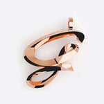Rose gold initials pendant with elegant script design and precision edge detailing