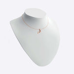 14K rose gold initials pendant necklace on white display bust