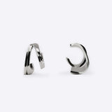 Sterling silver Cascade Ear Cuff with fluid undulating curves and sculptural design