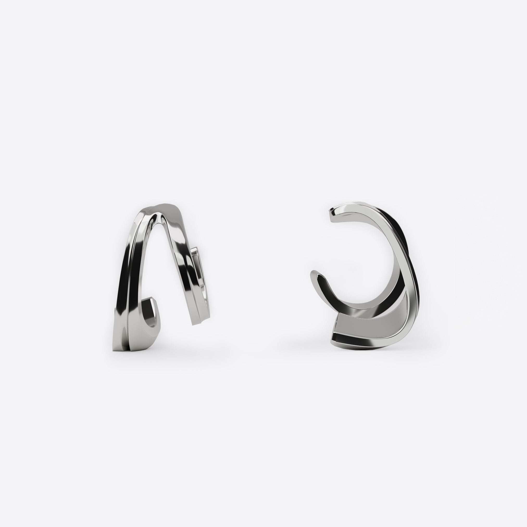Sterling silver Cascade Ear Cuff with fluid undulating curves and sculptural design
