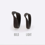 gray nylon Amos Sample Ring with twisting band design labeled bold and light options