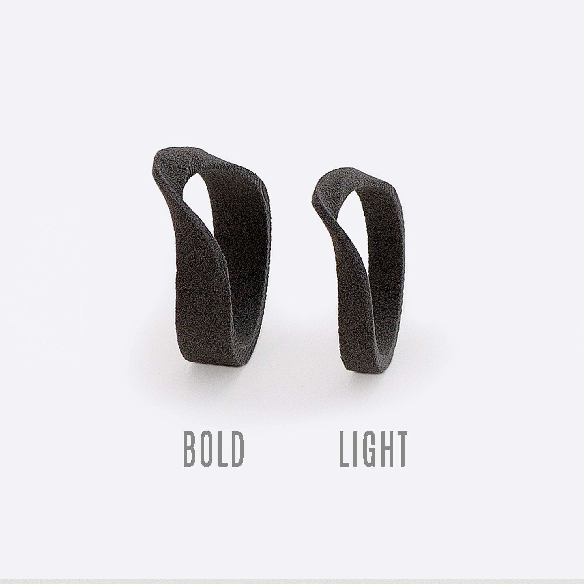 gray nylon Amos Sample Ring with twisting band design labeled bold and light options