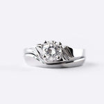 Agnes Wedding Band silver ring with a central round diamond solitaire on a smooth, elegant band design