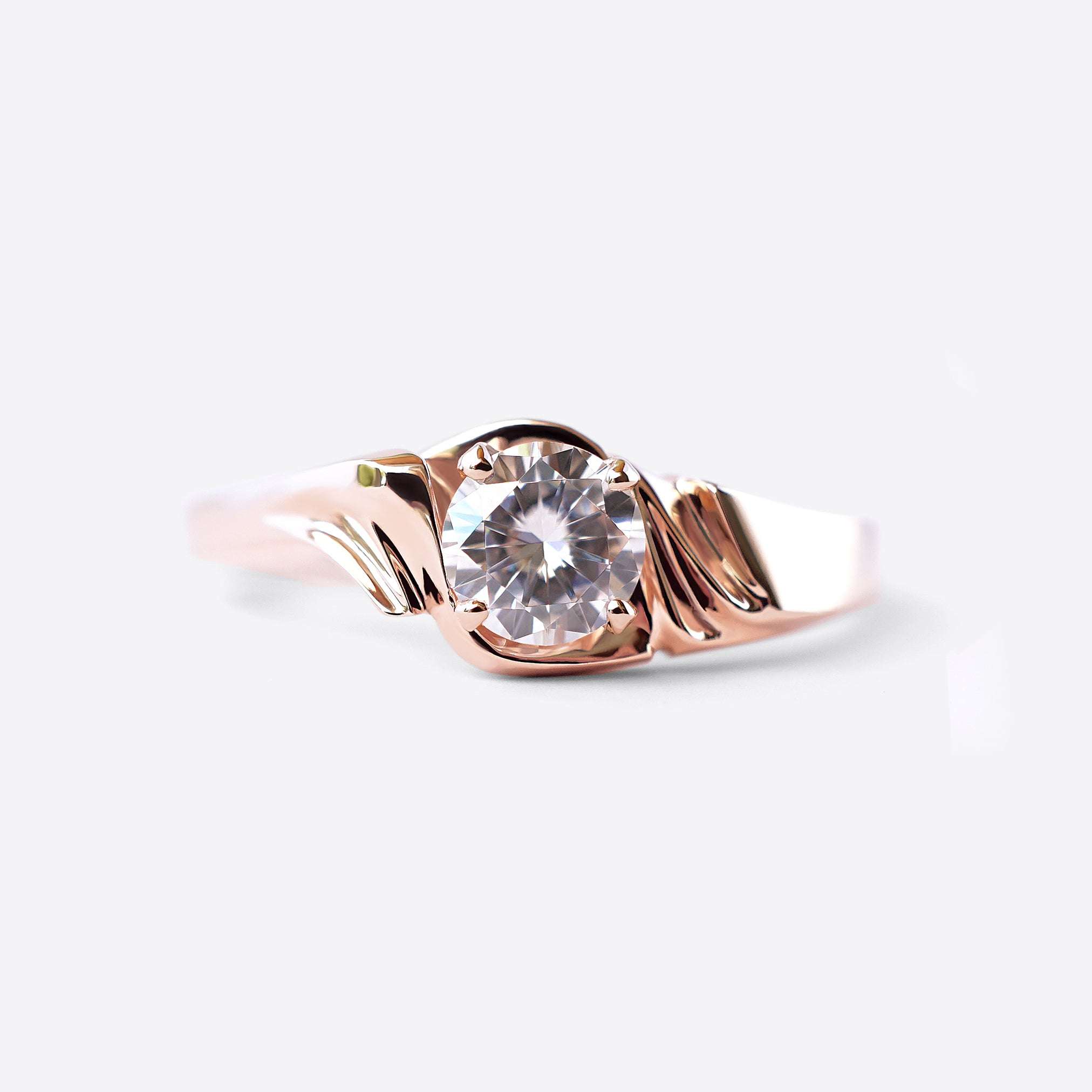 Rose gold Iris Diamond Ring with 0.5 carat round lab-grown diamond and drapery-inspired design