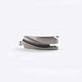 Close-up of a stainless steel matte link from a 3D printed adjustable Link Bracelet with ball joint connection.