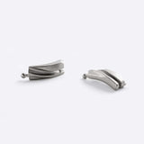Close-up of two stainless steel matte links from a Link Bracelet with unique ball joint connection system
