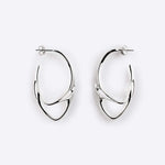 Sterling silver Eclipse Light earrings with two interlocking oval rings and polished finish