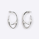 Sterling silver Eclipse Light earrings with two interlocking oval rings and polished finish