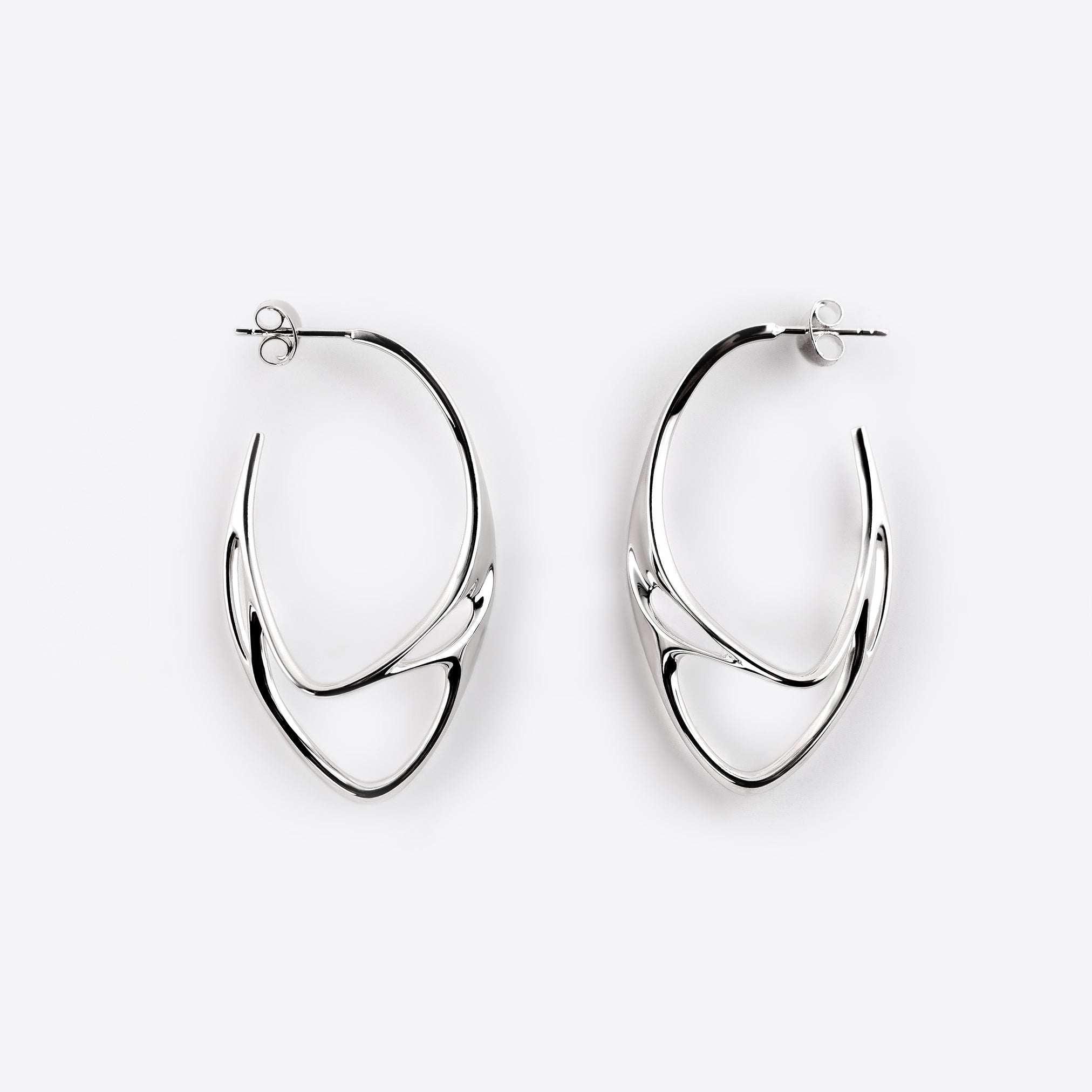 Sterling silver Eclipse Light earrings with two interlocking oval rings and polished finish