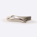 Allegro Cuff Carbon fiber bracelet with twisting, layered design and precision edges