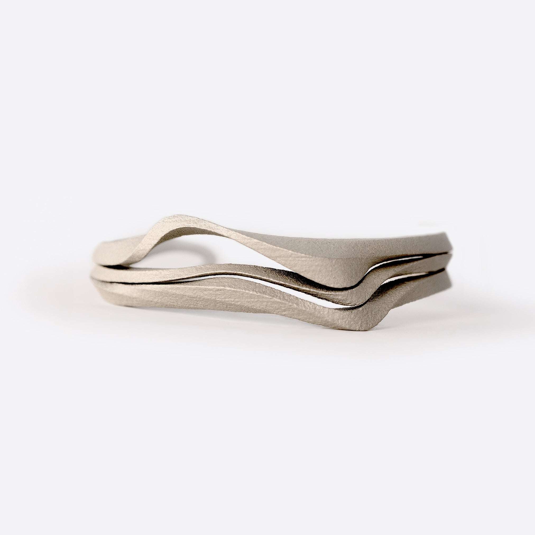 Allegro Cuff Carbon fiber bracelet with twisting, layered design and precision edges