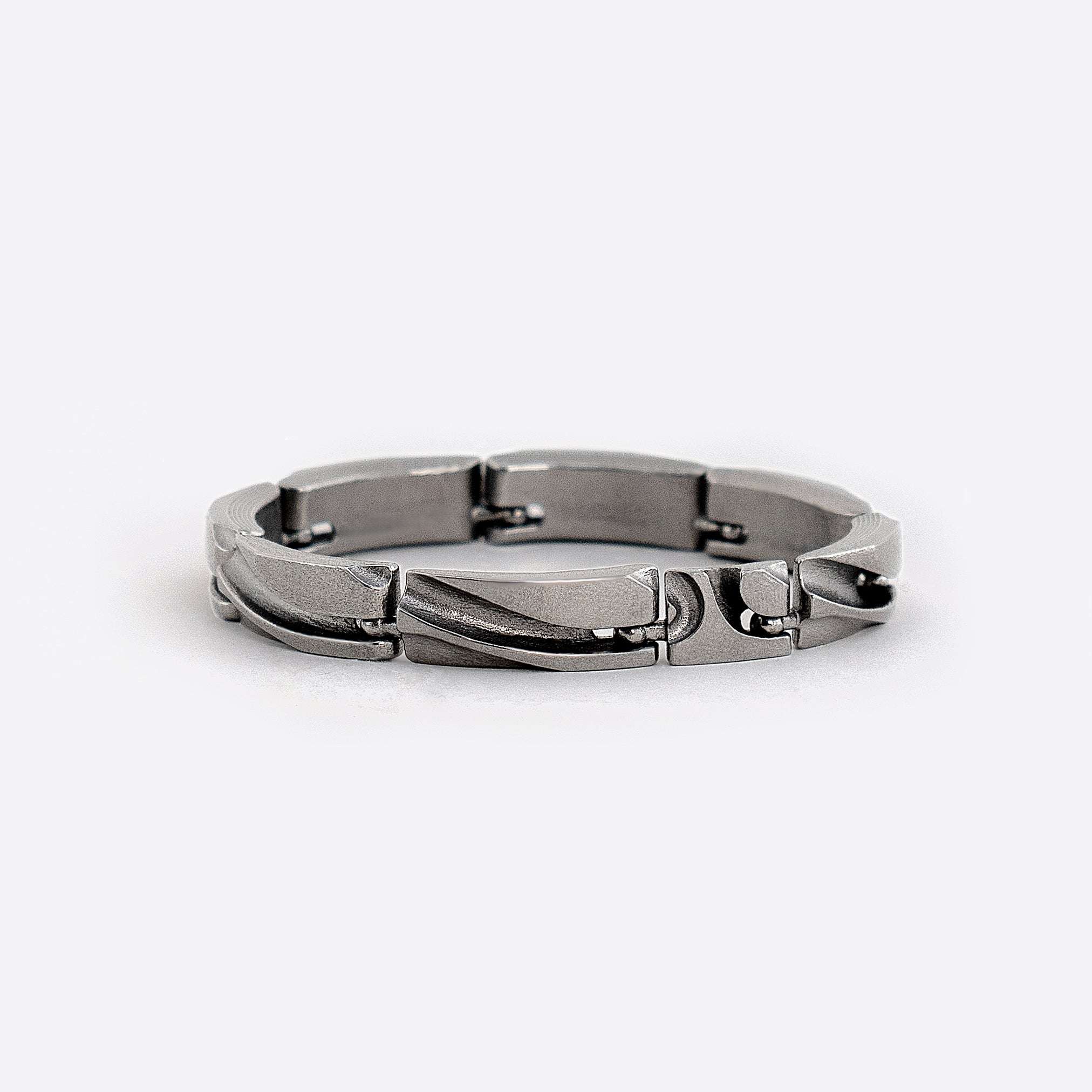 Modern unisex stainless steel link bracelet with unique ball joint connections and adjustable links